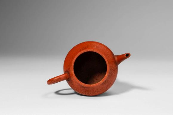 Apollo Art AuctionsQing Dynasty, Ca. AD 1644 - 1912. >A Yixing stoneware teapot of compact, globular form, the round