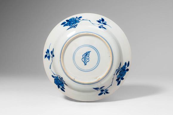 Apollo Art AuctionsKangxi Period, Qing Dynasty, Ca. AD 1661 - 1722. >A finely painted blue and white porcelain dish