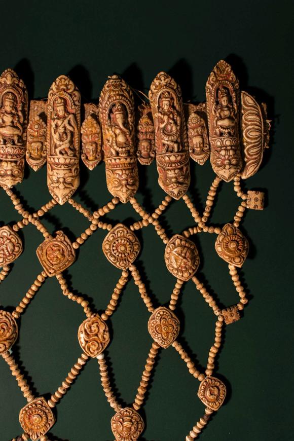Apollo Art AuctionsCa. 16th - 17th century AD. >
An elaborate ritual bone apron composed of intricately carved plaqu