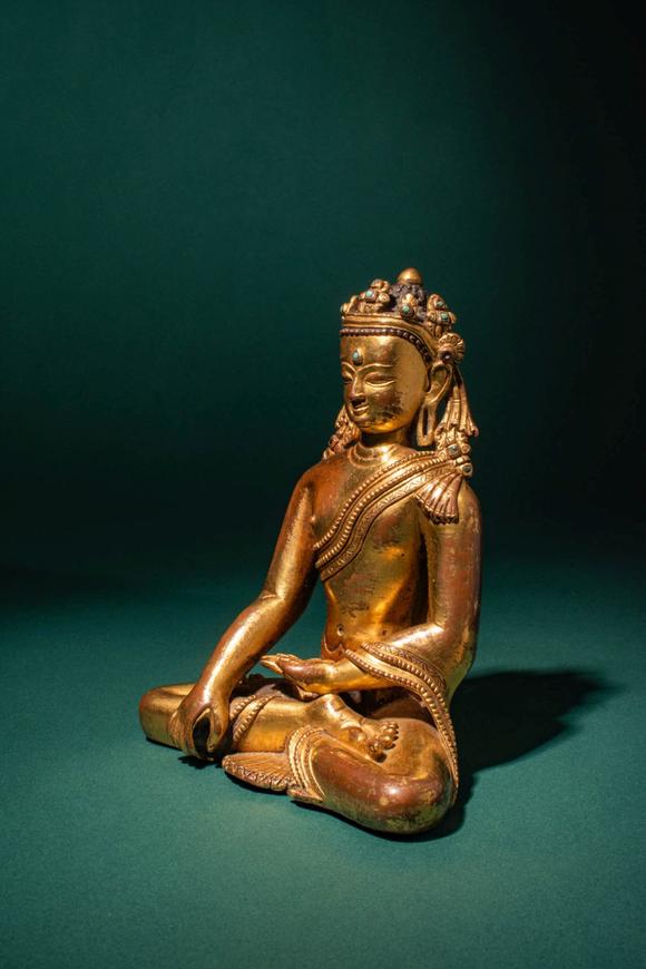 Apollo Art AuctionsCa. 15th century AD. >
A finely cast and richly gilded copper alloy figure of the Crowned Buddha