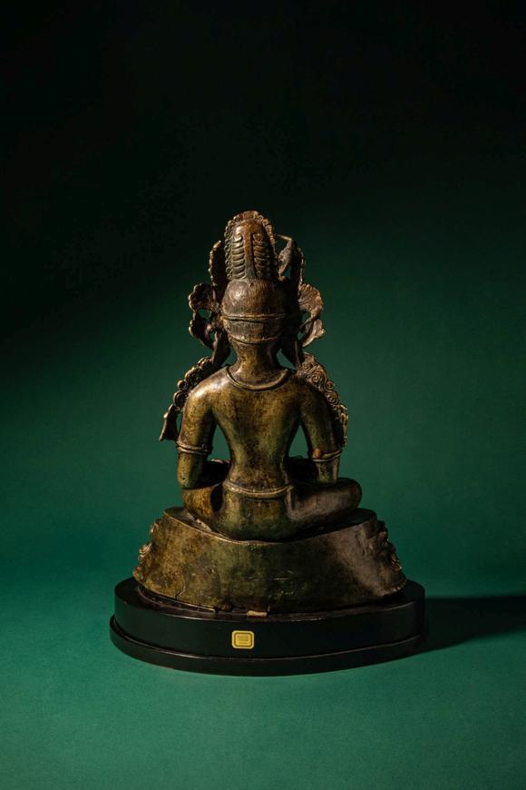 Apollo Art AuctionsCa. 14th century AD. >
A finely cast copper alloy figure depicting Kunzang Akor, seated in serene