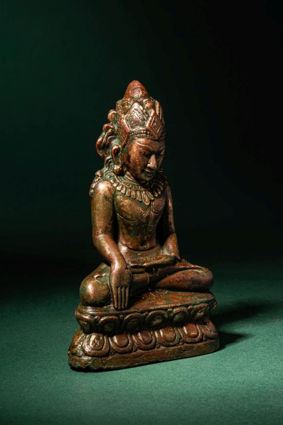 Apollo Art AuctionsCa. 12th - 13th century AD. >
A finely cast bronze figure of Buddha Shakyamuni, seated in bhumisp