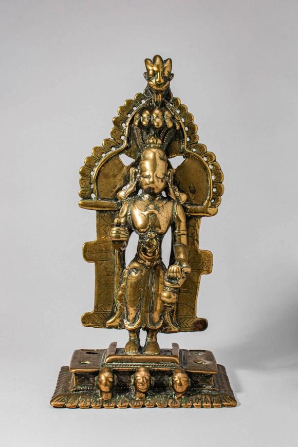 Apollo Art AuctionsCa. 17th-18th century AD.
A cast brass figure of Jina Parsvanatha, the 23rd Tirthankara, standing