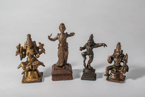 Apollo Art AuctionsCa. 14th-19th century AD. A group of four cast bronze figures depicting various Hindu deities, in