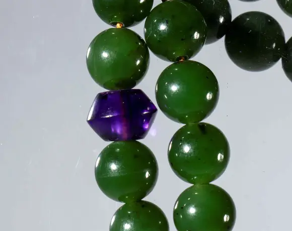 Bertolami Fine ArtMala composed of 108 green jade, carnelian, amethyst, smoky quartz, and citrine beads. China, Qing Dynasty (1644-1912), 19th century.