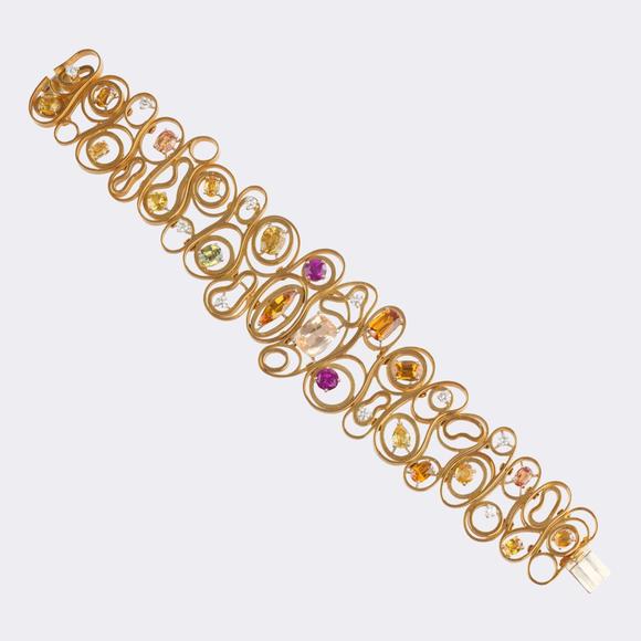 Auktionshaus StahlBaltensperger est. 1878 Zurich. Rare vintage gold bracelet with multicolored sapphires.