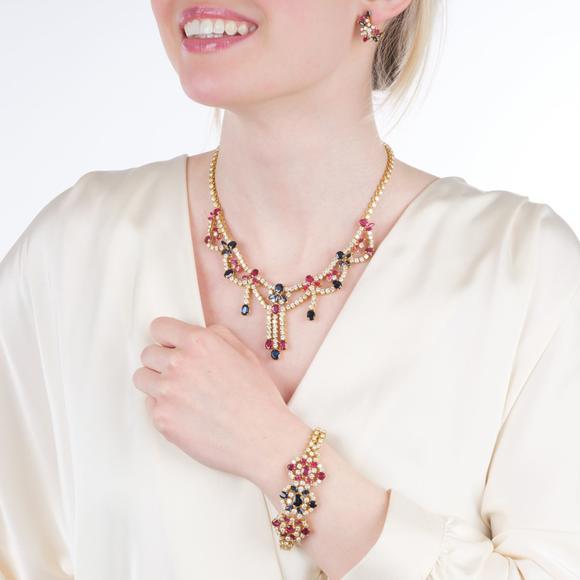 Auktionshaus StahlSplendid Ruby Sapphire and Diamond Parure with Feston Necklace, Bracelet and Pair of Earrings.
