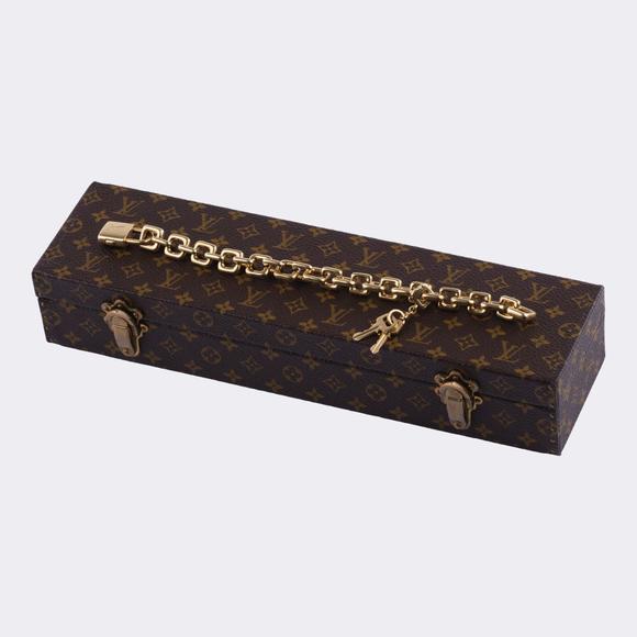 Auktionshaus StahlLouis Vuitton. 'Padlock and Key' Charm Gold Bracelet.