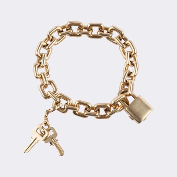 Auktionshaus StahlLouis Vuitton. 'Padlock and Key' Charm Gold Bracelet.