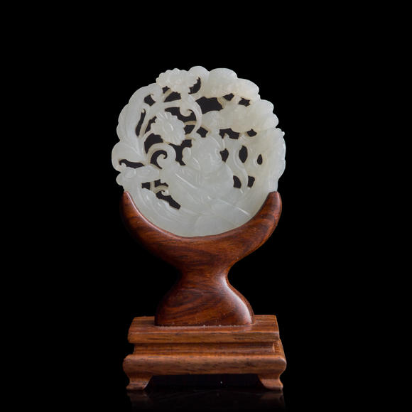 Oakridge Auction Gallery十九世紀早 白玉鏤雕童子佩（附木座）  A Chinese reticulated white jade 'boy' plaque