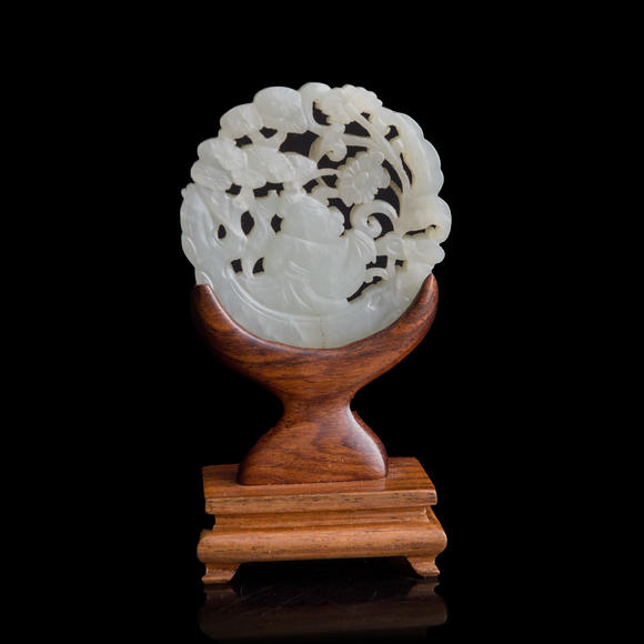 Oakridge Auction Gallery十九世紀(jì)早 白玉鏤雕童子佩（附木座）  A Chinese reticulated white jade 'boy' plaque