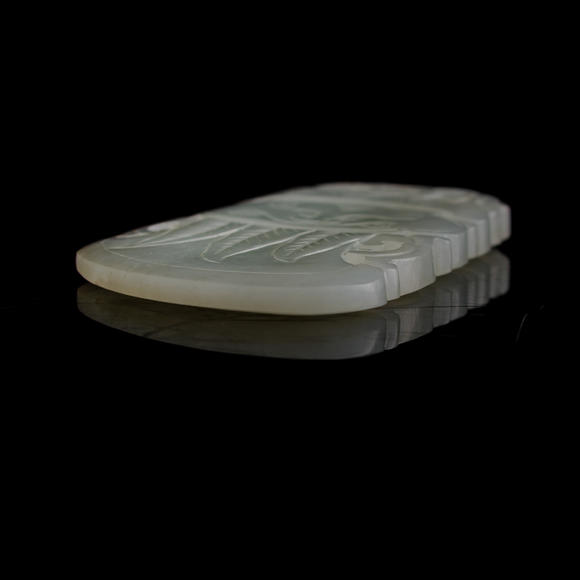 Oakridge Auction Gallery十八世紀(jì) 白玉斧形佩（附木座）  A Chinese carved white jade axe-form pendant