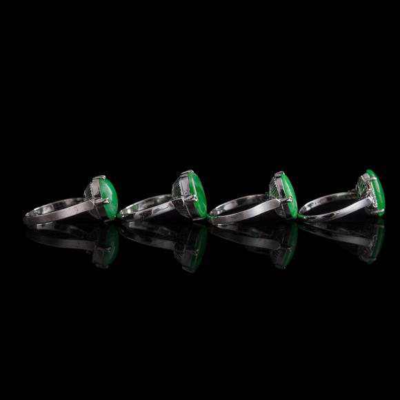 Oakridge Auction Gallery金屬鑲翡翠戒指四隻  Four Chinese jadeite-set white metal rings