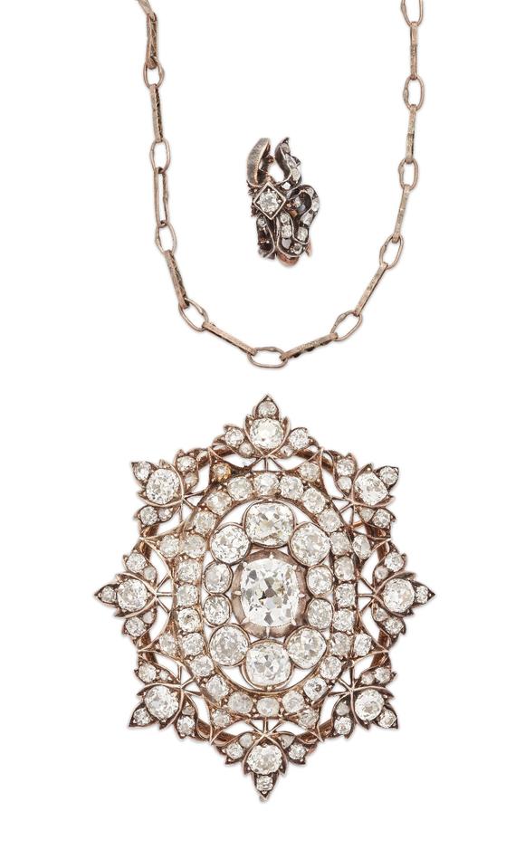 RoseberysA late Victorian diamond pendant/brooch, of openwork form, set with old-cut diamonds of varying size, mounted in silver, backed with gold, to a radiat