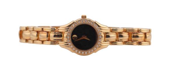 Clarke Auction GalleryJEWELRY. Lady's Movado 14kt Gold Diamond Bracelet