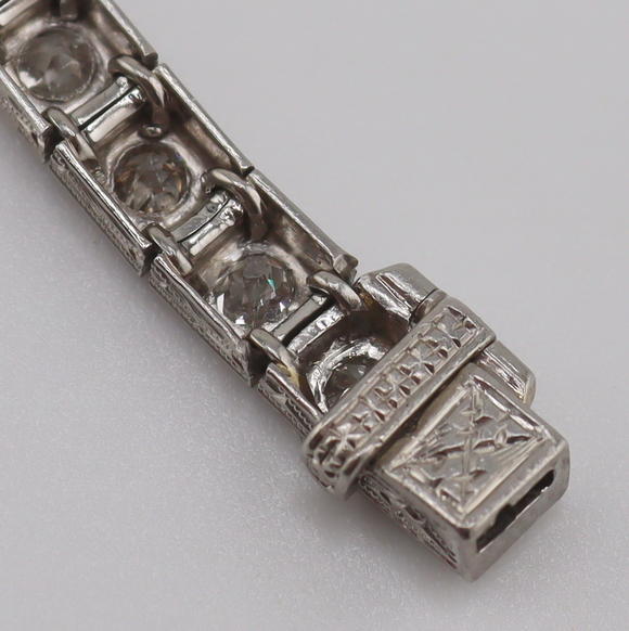 Clarke Auction GalleryJEWELRY. Art Deco Platinum, Diamond and Onyx