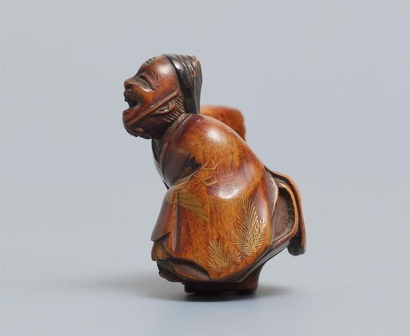 Kunsthaus Lempertz KGA small boxwood netsuke of a manzai dancer. 19th century