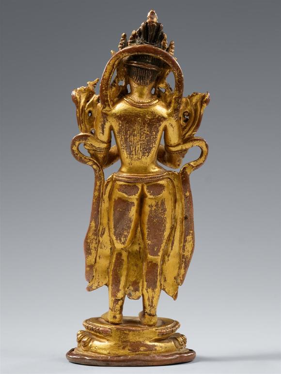 Kunsthaus Lempertz KGA small Nepalese fire-gilt copper alloy figure of Maitreya. 14th century