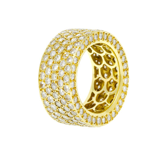 Piguet - H?tel des VentesAnneau rivière or 750 entièrement pavé de diamants taille brillant et de quelques diamants d'imitation