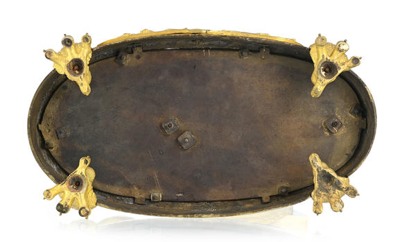 Piguet - H?tel des VentesPendule dite à lanterne magique d'époque Restauration, en bronze doré et finement ciselé, 47x25x14 cm