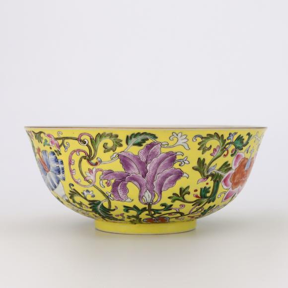 KARSON AUCTIONQing Dynasty Jiaqing period, Yellow-ground famille rose bowl with passion flower patterns