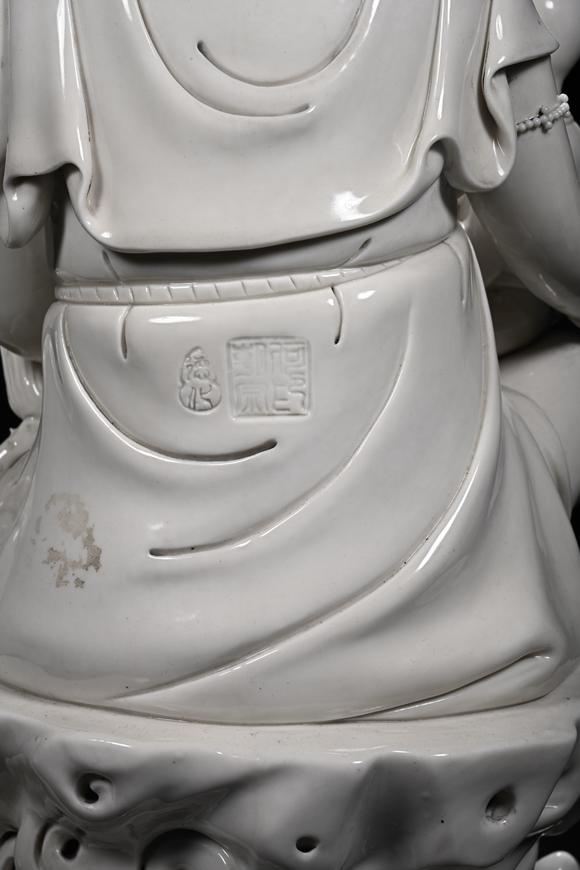 HUNG YUN ZHAI AUCTION HOUSE INCDehua White-Glazed Songzi Guanyin (Bestowing Children)