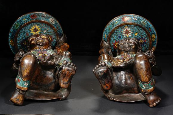 HUNG YUN ZHAI AUCTION HOUSE INCPair of Bronze Cloisonné Enamel Candelabra with Central Asian (Hu) Figure Motif
