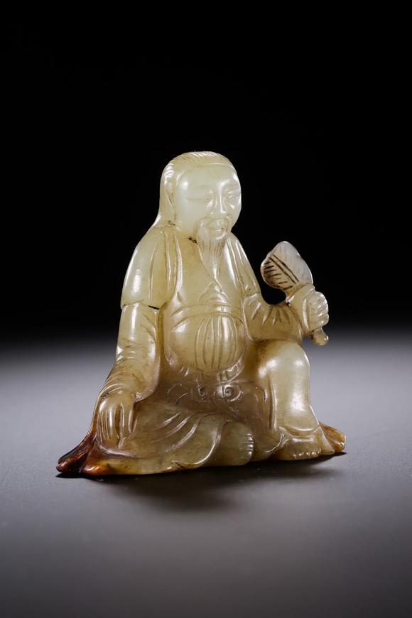HUNG YUN ZHAI AUCTION HOUSE INCHetian Jade Seated Scholar Figure