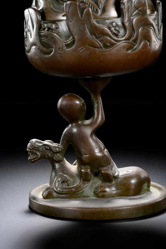 HUNG YUN ZHAI AUCTION HOUSE INCBronze Boshan Incense Burner with Central Asian (Hu) Figure Riding a Beast