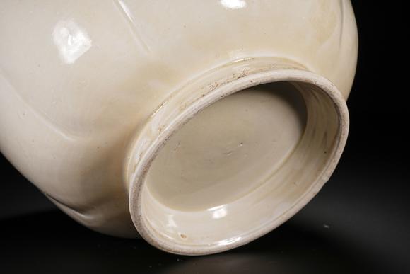 HUNG YUN ZHAI AUCTION HOUSE INCPre-Ming Dynasty Ding Kiln White-Glazed Wine Warmer