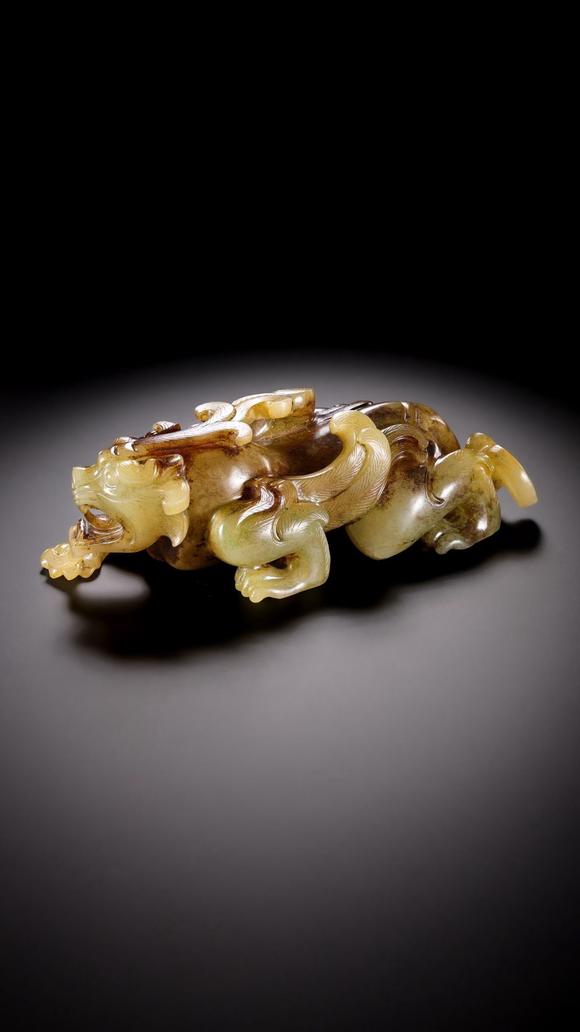HUNG YUN ZHAI AUCTION HOUSE INCPre-Ming Dynasty Hetian Jade Auspicious Beast