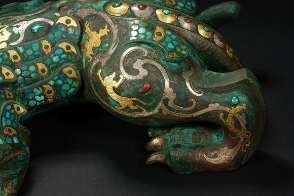 HUNG YUN ZHAI AUCTION HOUSE INCPre-Ming Dynasty Gold and Silver Inlaid Inscribed Mythical Beast
