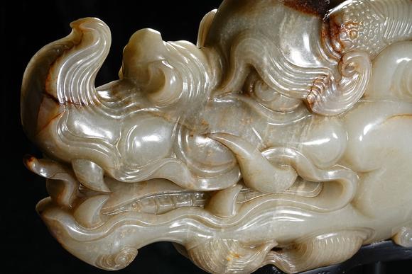 HUNG YUN ZHAI AUCTION HOUSE INCPre-Ming Dynasty or Earlier Hetian Jade Dragon-Head Ornament