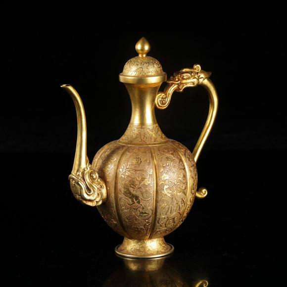 藝是拍賣(mài)銅鎏金鏨花酒具一套（執(zhí)壺+杯盞+托盤(pán))