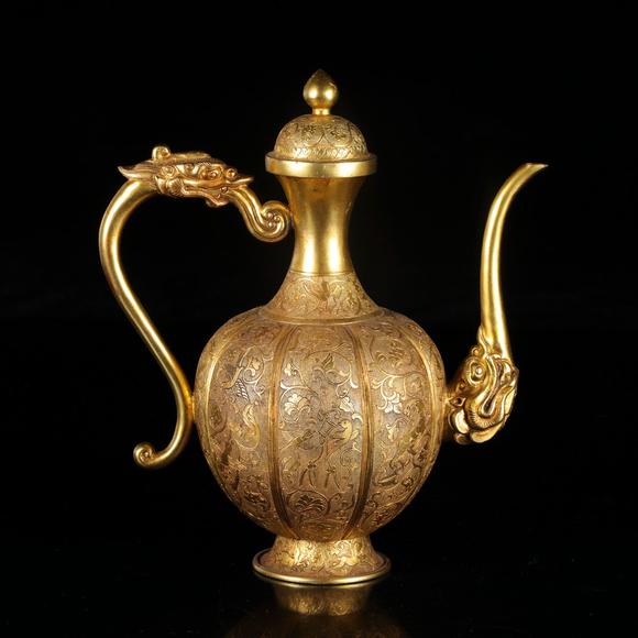 藝是拍賣(mài)銅鎏金鏨花酒具一套（執(zhí)壺+杯盞+托盤(pán))