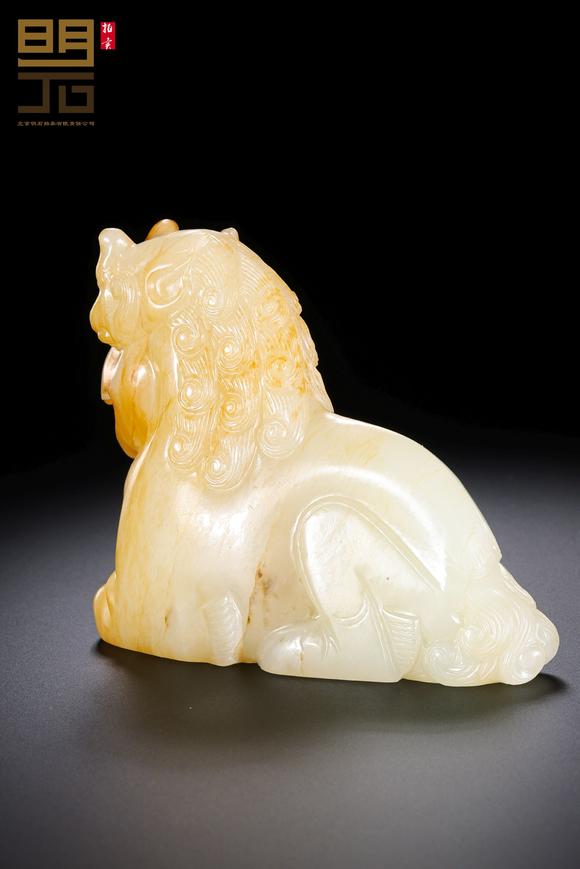 北京明石拍賣有限公司明 白玉紅沁獅鷲神獸