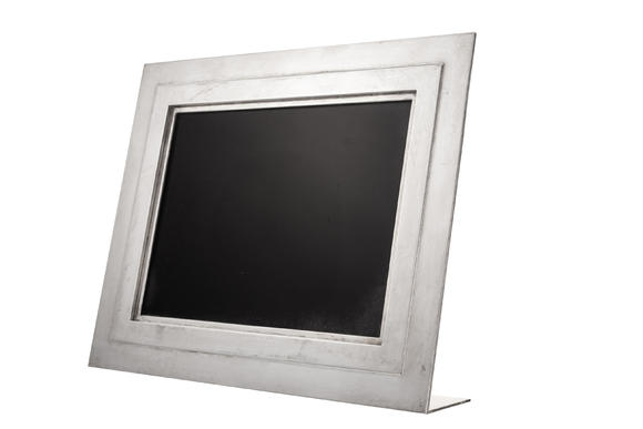 Piguet - H?tel des VentesHERMèS. Cadre à photographie en métal argenté, Paris, XXe s., revers en bois, h. 26 cm
