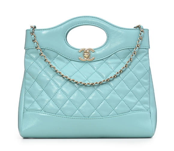 Piguet - H?tel des VentesChanel, sac 31 Mini Tote en cuir brillant turquoise, double bandoulière en cuir simple et à cha?nette et cuir entrelacé, housse, 23x20 c