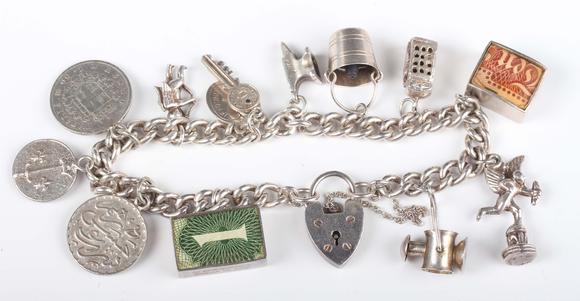 TooveysA silver curblink charm bracelet on a silver heart shaped padlock cl