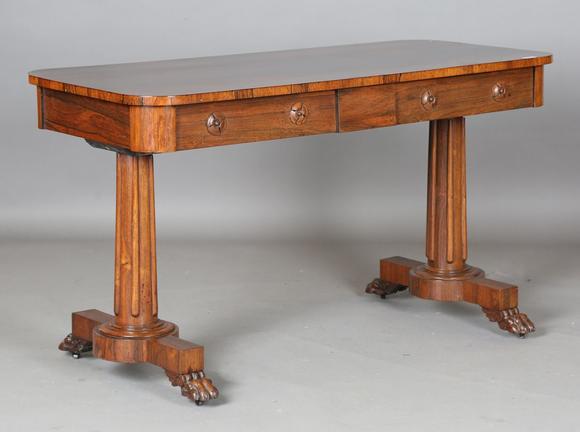 TooveysAn early Victorian rosewood centre table, fitted with two frieze dra