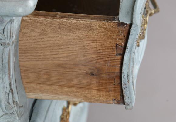 TooveysA 20th century French rococo style painted three-drawer commode, the