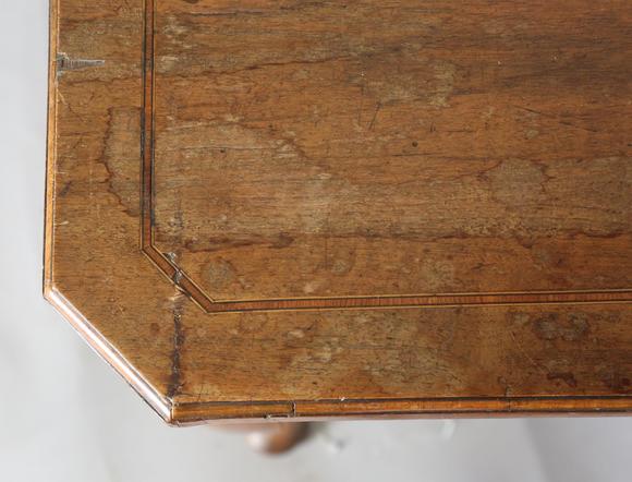 TooveysAn 18th century and later walnut lowboy, fitted with three oak-lined