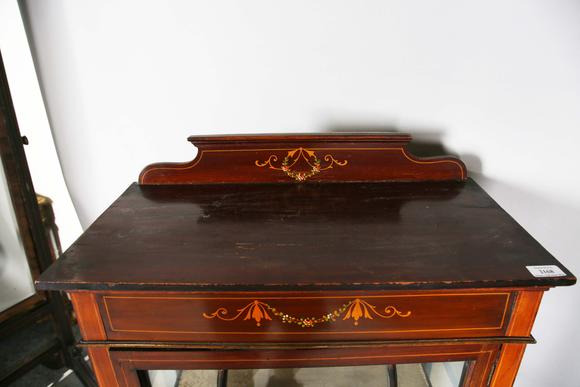 TooveysAn Edwardian mahogany display cabinet with inlaid and painted frieze