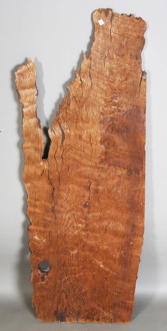TooveysAn unusual wooden panel, covered in various incised letters and symb