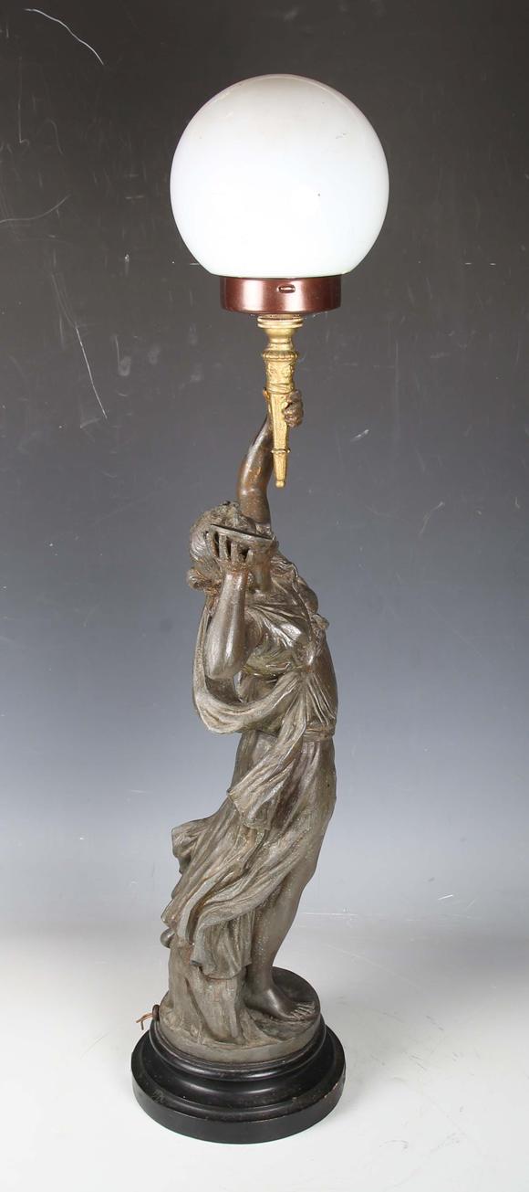 TooveysA late 19th century cast spelter figural table lamp in the form of a
