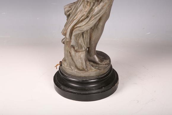 TooveysA late 19th century cast spelter figural table lamp in the form of a