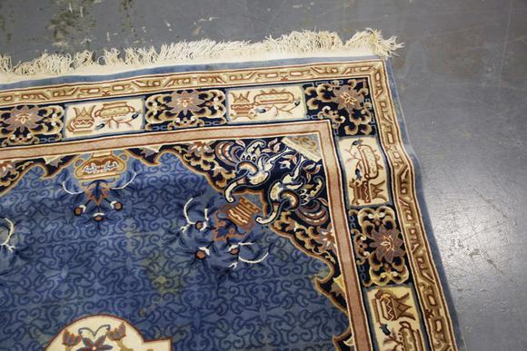 TooveysA Chinese carpet, late 20th century, the blue field with a floral me