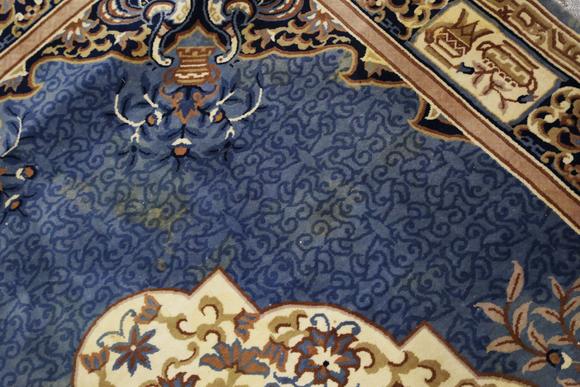 TooveysA Chinese carpet, late 20th century, the blue field with a floral me