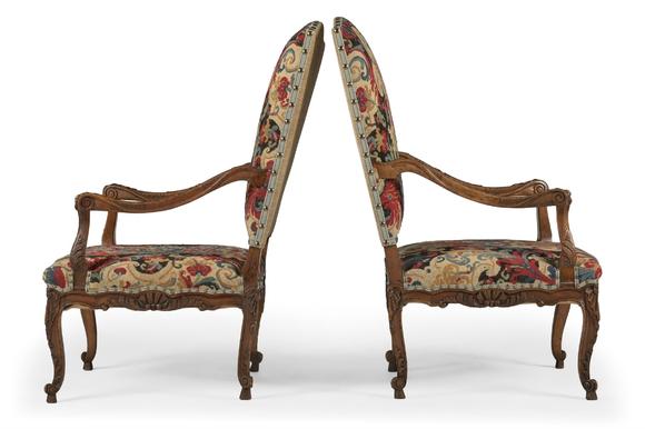 DreweattsA PAIR OF CARVED WALNUT AND NEEDLEWORK UPHOLSTERED FAUTEUILS, IN REGENCE STYLE, 19TH CENTURY