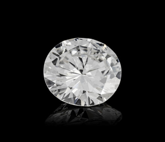 Piguet - H?tel des VentesUn diamant taille brillant sur papier de 5.19 carats, avec sa monture solitaire en or gris 750